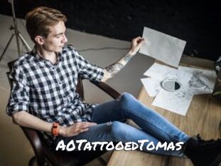 A0TattooedTomas